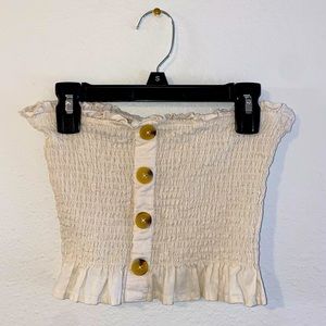 Tan/cream sleeveless top with tortoiseshell buttons